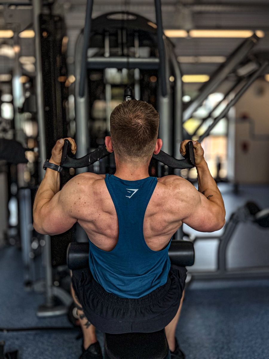Back muscle development from personal training showing results achievable without traditional gym