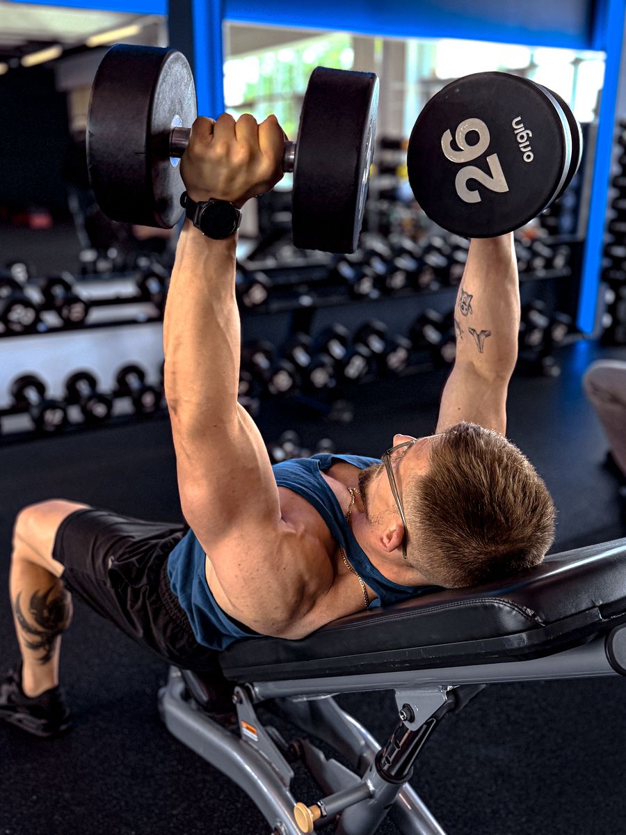Incline dumbbell press during personal training session in Slough