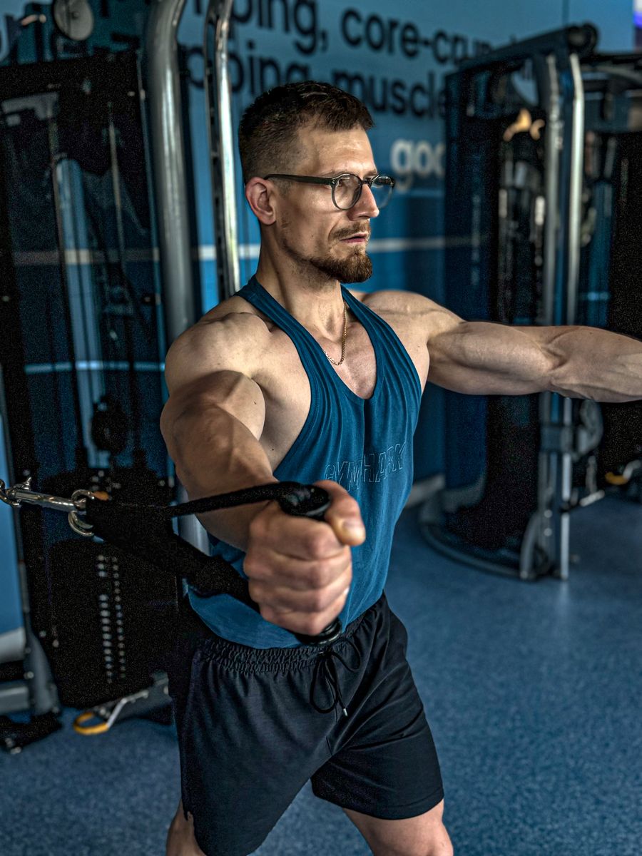 Cable crossover chest exercise during training session