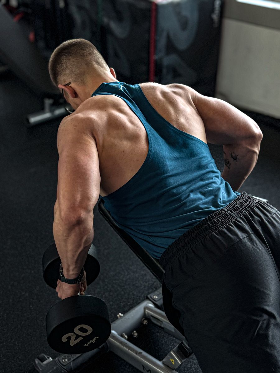 Single-arm dumbbell row coached at Atypical Trainer studio in Slough